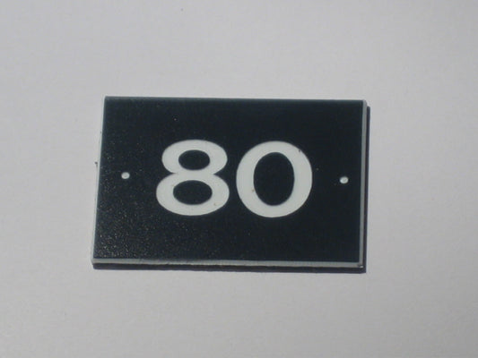 Merkeskilt i plastlaminat