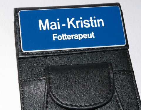 Navneskilt i plast til skinnmappe